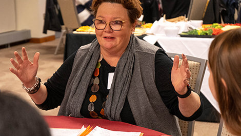 Peg Campbell speaks with BSU students.