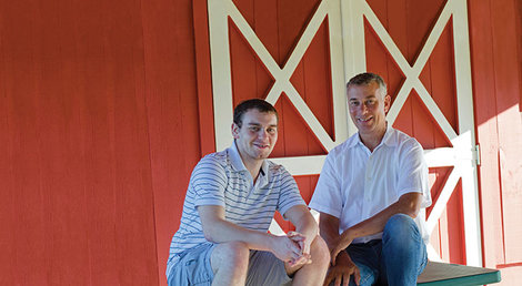 R0y Noepel, '92, and his son Eric, '19, spend time together at Adams Farm in Walpole, where the senior Noepel serves as a volunteer.