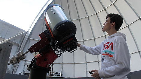 Antu Stettler adjusts a telescope in BSU's observatory.