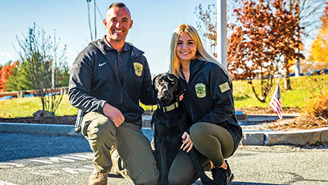 Sarah Carlozzi with BSUPD Captain Ryan Tepper and Outreach Dog Zach