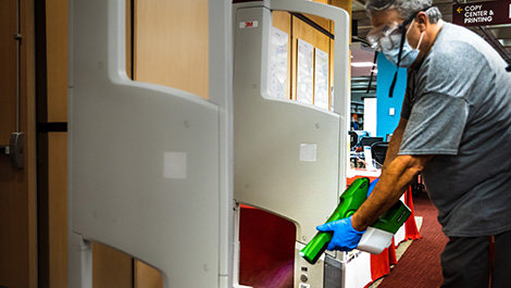 A maintainer cleans the library