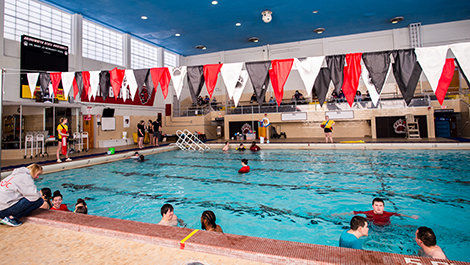 People swim in Moriarty Pool.