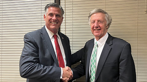 Michael Taylor shakes hands with President Clark.