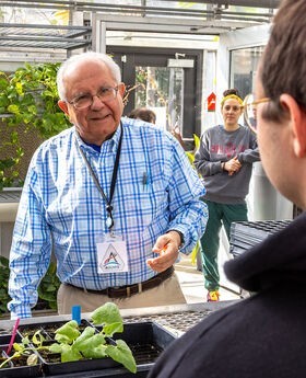 Paul Fredette teaching Intro to Physics in the BSU Greenhouse