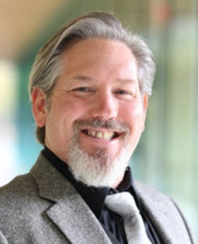 headshot photo of Dr. Michael Devalve