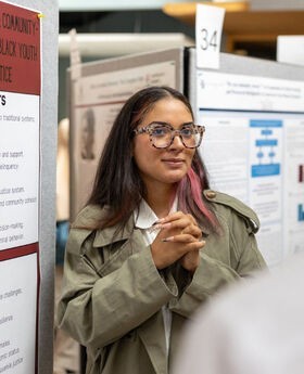 Carla Victoria Alves, BSU Honors student, presenting at BSU Symposium