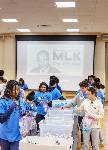 student volunteers assembling bags of items to give to those in need at BSU MLK Day of Service 