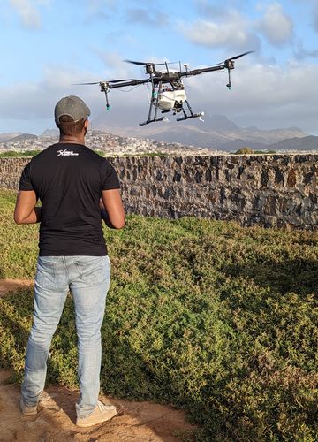 Erico Fortes flying an agricultural reforestation drone